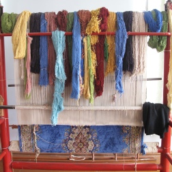 Silk woven carpet, coloured using natural dyes.