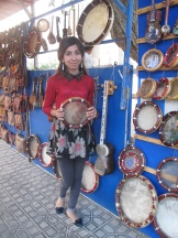 Tambourine seller Bukhara, Richard bought one of these. Uzbekistan.