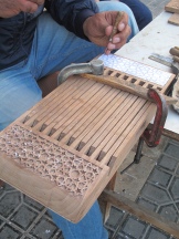 Woodcarver, detail, Bukhara. Uzbekistan.